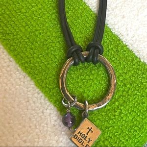 Leather bracelet and charm holder